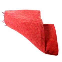 Bright orange yak shawl handwoven at a women cooperative in Nepal